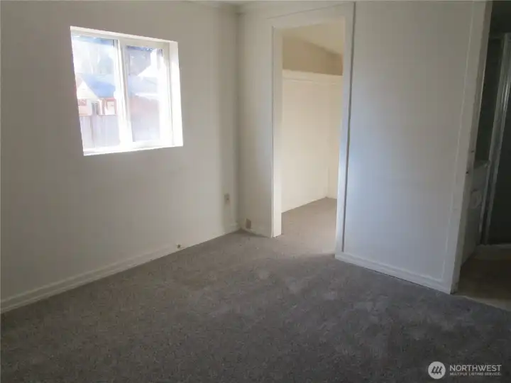 The sleeping place in this one-bedroom apartment.