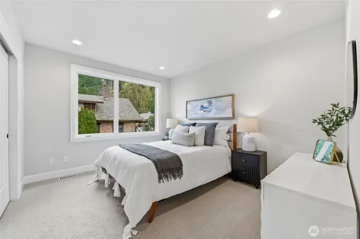 Another auxilary bedroom tucked at end of home.