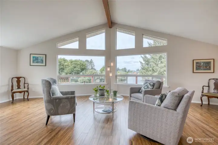 Spacious living room with gorgeous canal views.