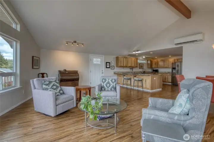 Exposed wood beam and hickory cabinetry compliment the warm and inviting space.