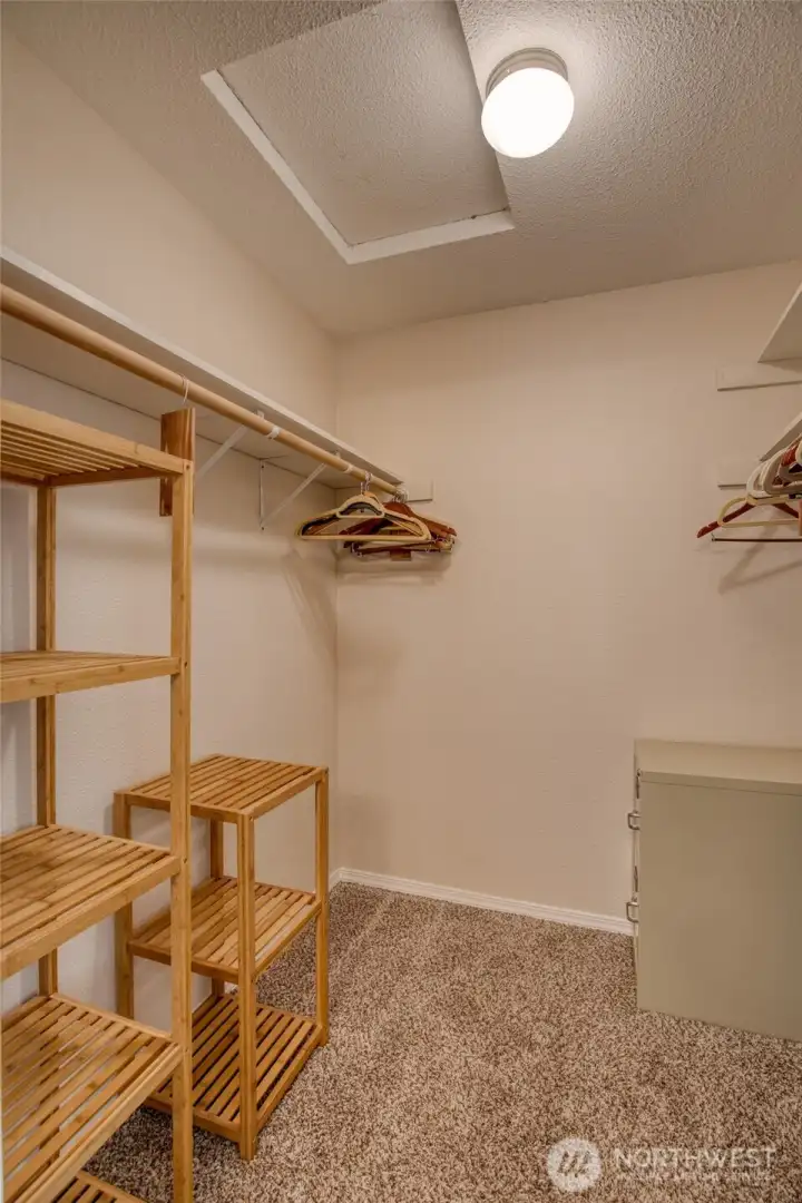 Walk in closet for upper primary suite.