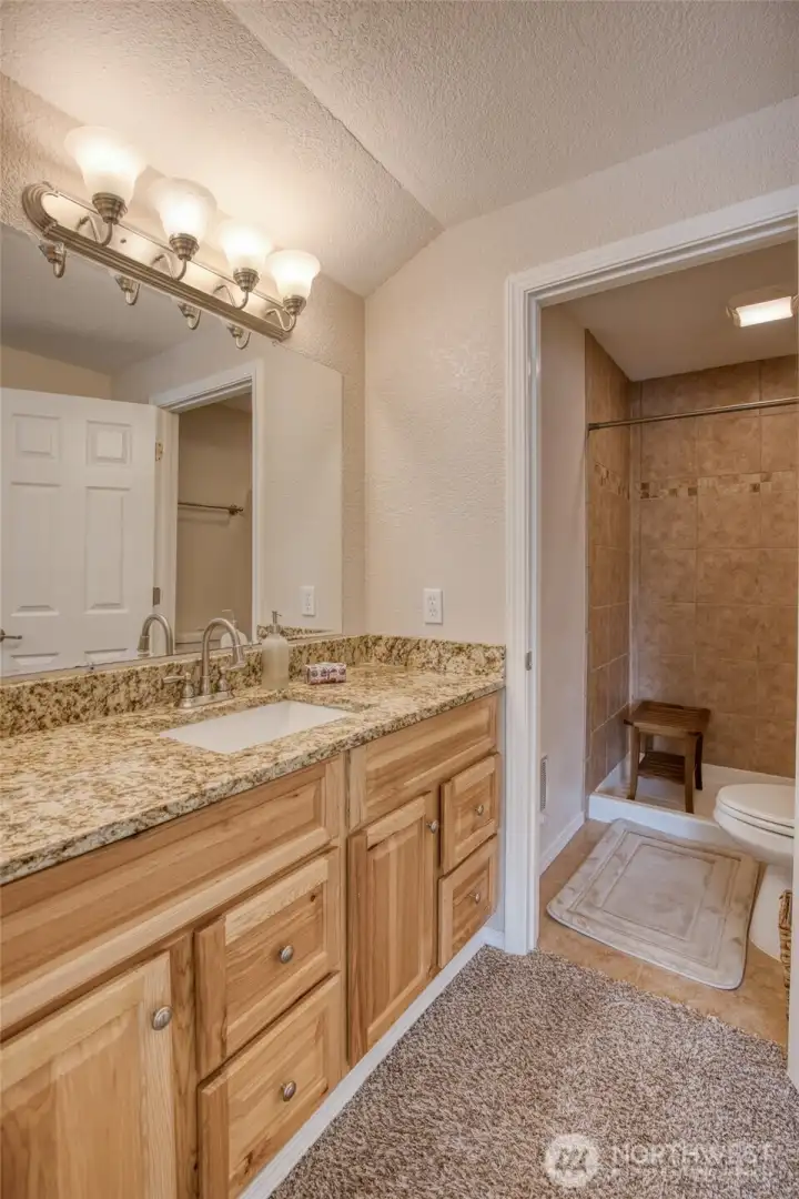 Ensuite bathroom in upper primary suite.