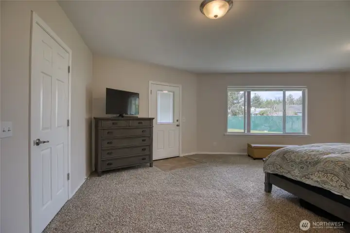 Now entering the first floor primary suite.