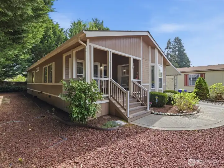 Tree lined lot gives you seclusion and privacy, while still living within the community.