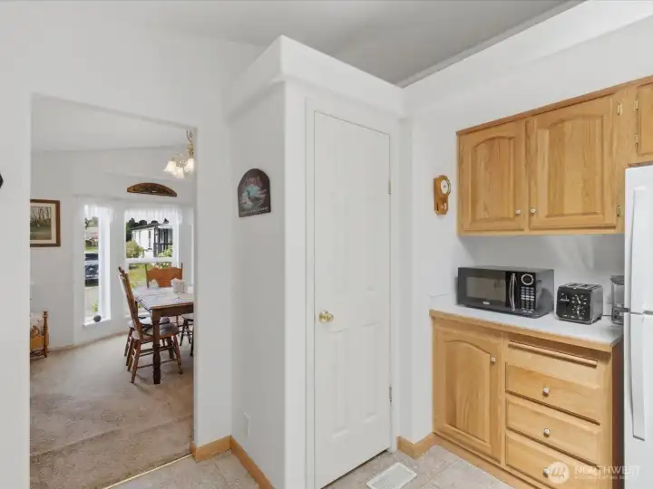 Full pantry in the kitchen, looking out into the dining room.