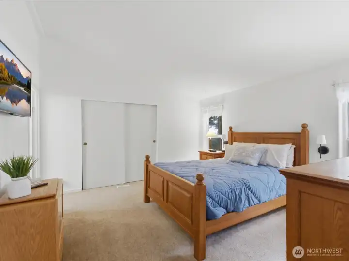 Primary bedroom with dual closets