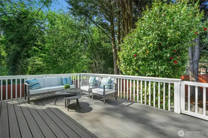 Large, low maintenance composite deck for enjoying the privacy and surrounding PNW setting.