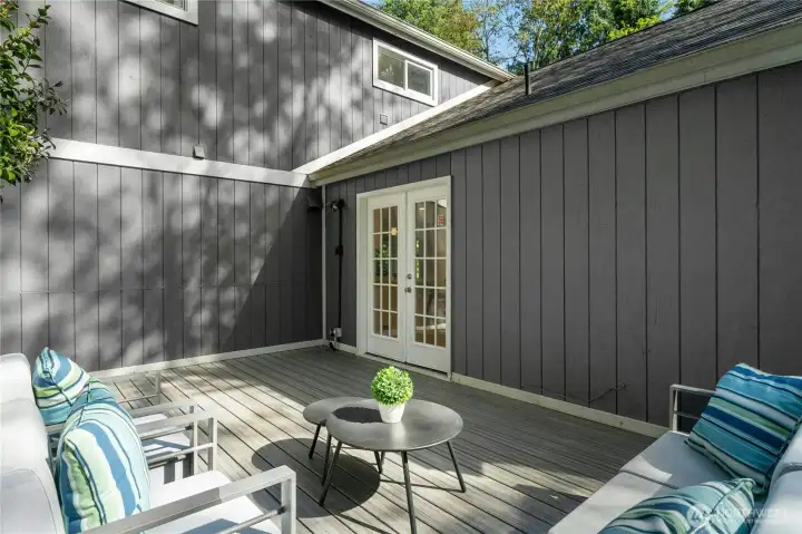 Main level deck located just off the Family Room and Kitchen for grilling & dining or simply relaxing.