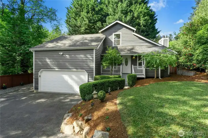 Set off NE 155th St, down a private lane, this property feels tucked away while remaining close to everything Kenmore has to offer.