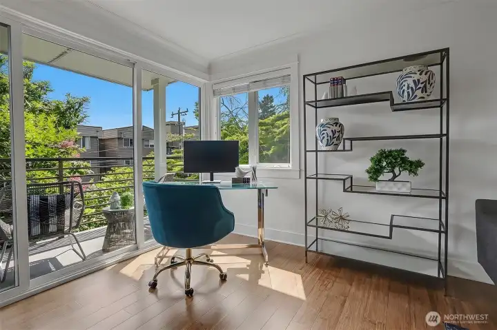 The perfect work-from-home perch with abundant natural light and easy outdoor access for refreshing breaks. The perfect work-from-home perch with abundant natural light and easy outdoor access for refreshing breaks.