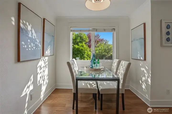A dedicated dining space pairs beautifully with warm wood floors that flow throughout the home. A dedicated dining space pairs beautifully with warm wood floors that flow throughout the home.