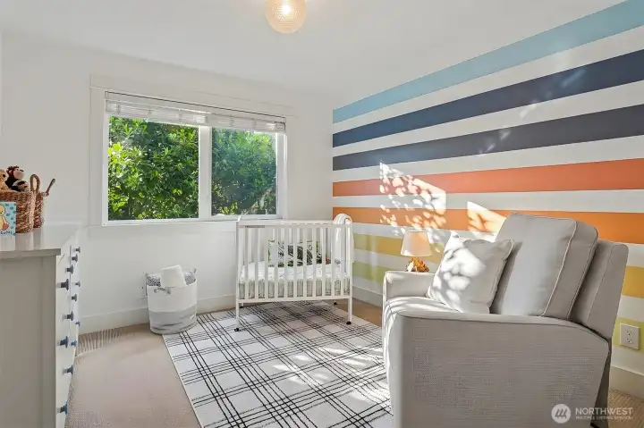 Flexible second bedroom currently serving as a sweet nursery. Flexible second bedroom currently serving as a sweet nursery.