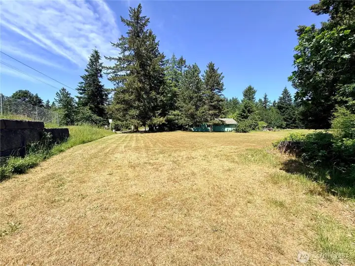 Scenic view of the property with the cabin in sight.