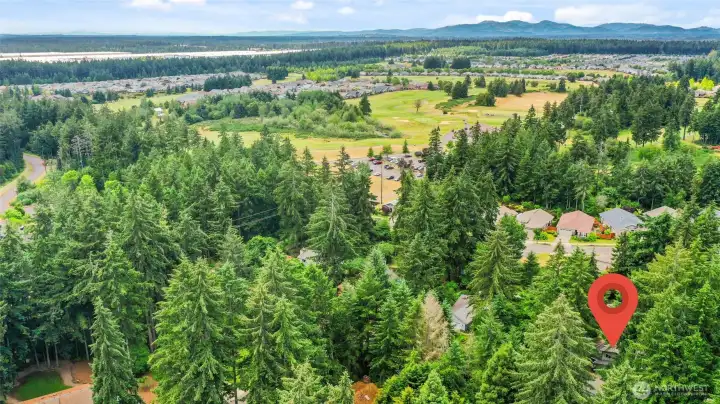 Right behind the property is a greenbelt and Jubilee neighborhood and The Hawks Prairie 18-Hole Golf Course.