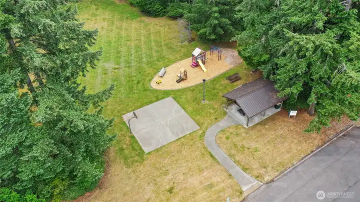Community playground, basketball court, Big Toys and covered picnic area.