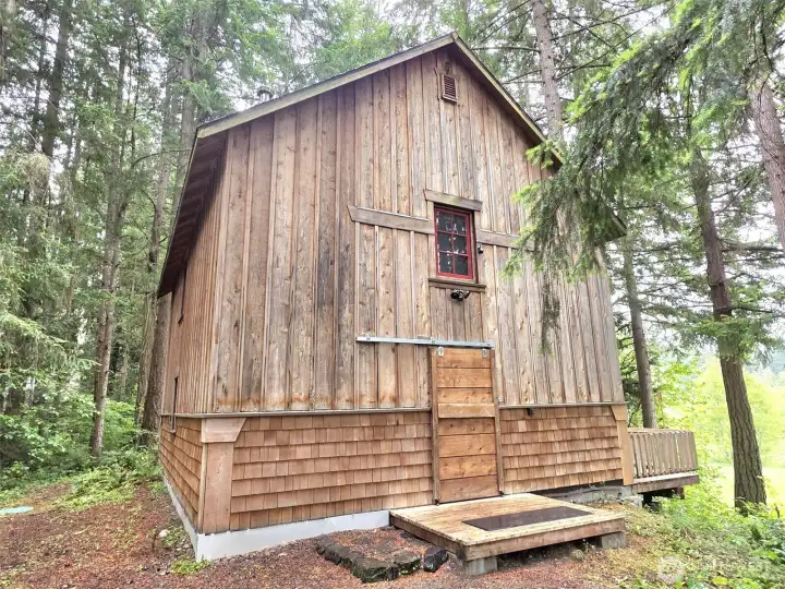 Cedar cabin with wrap around deck. Cedar cabin with wrap around deck.