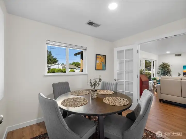 3rd bedroom   with french doors opening to the living room. Currently used as a dining room
