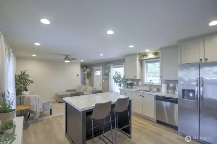 KITCHEN LOOKING INTO LIVING ROOM