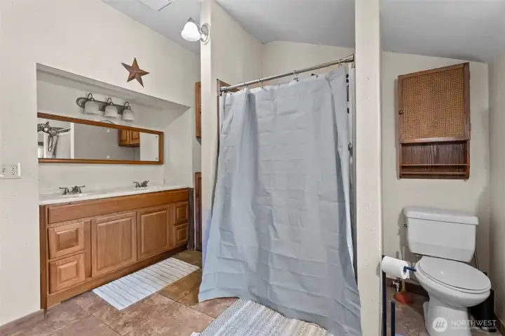 Walk-in shower and double vanity. Walk-in shower and double vanity.