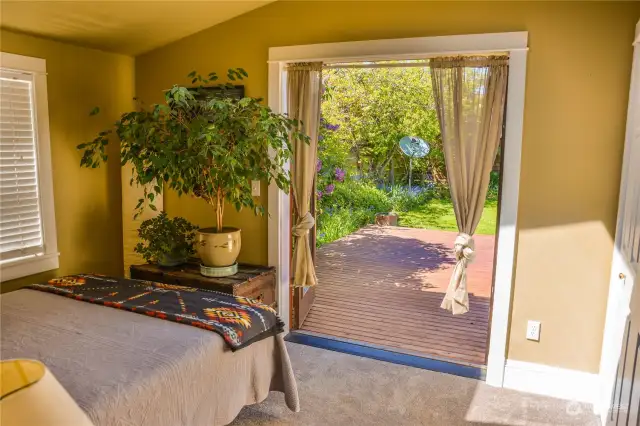 Bedroom opens onto backyard patio