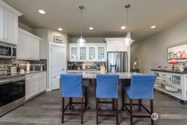 Looking back into the kitchen and the hall to the front door.