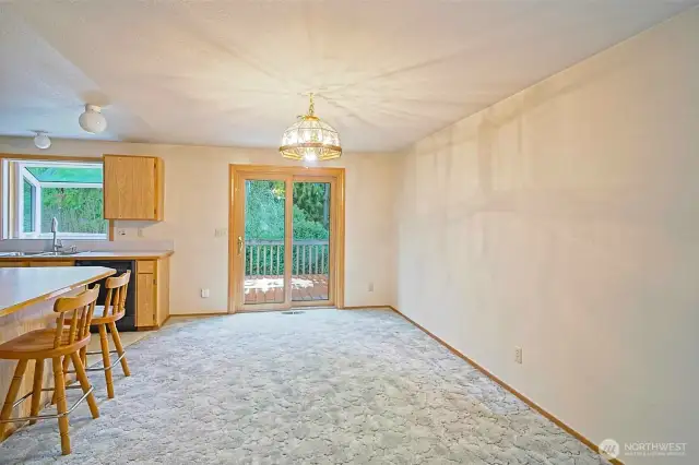 Dining room on the upper level with an access to the Trex back deck.