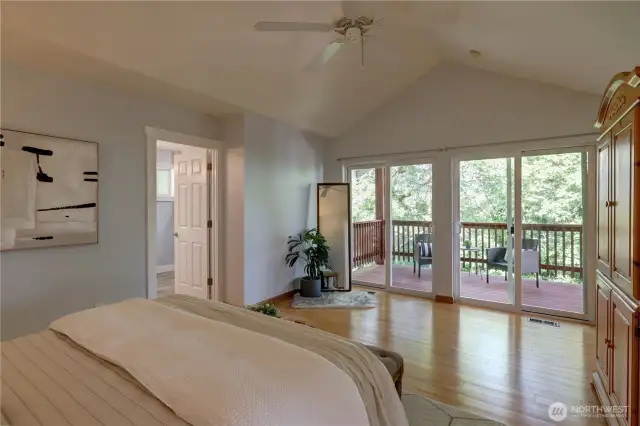 Primary bedroom suite w/ balcony access