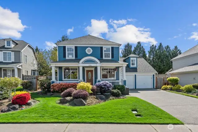 Gorgeous curb appeal with meticulously cared for landscaping and new roof install 2022