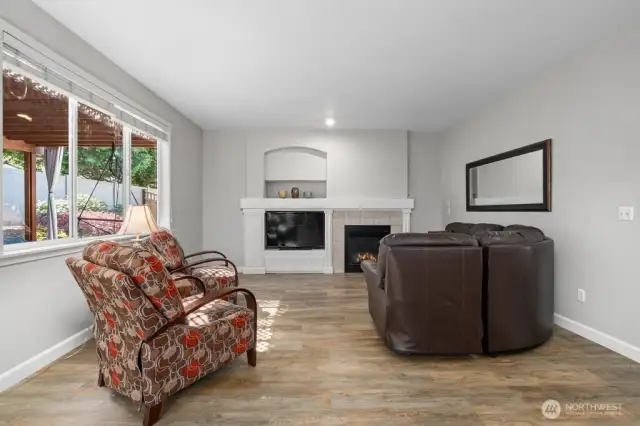 Living room/rec room in the back part of home, on the other side of kitchen