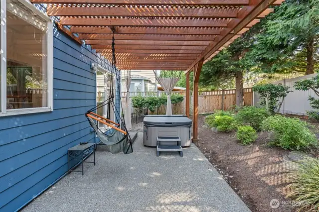 Backyard oasis with small, fully functional, clean and regularly used hot tub