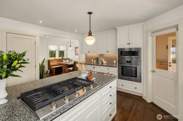 Natural light flows beautifully into this space all day long, thanks to NW-facing windows and doors to the back, and southwest light pouring into the casual eating nook.