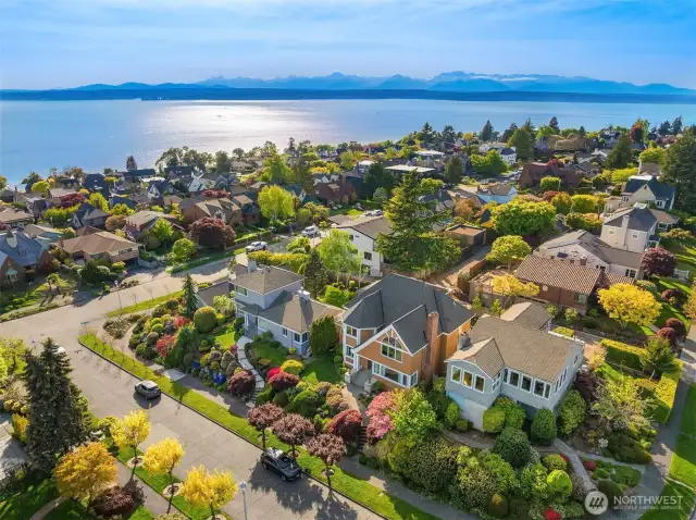 Easily one of the prettiest neighborhoods in Seattle, and this home is at its pinnacle!  Views sweep from Downtown/Elliott Bay/Mt Rainier, west toward the majestic Olympic Peninsula and Mountains.  Sunsets are mesmerizing.