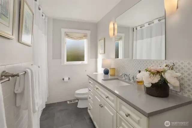The sunny main-floor full bath was also remodeled in 2017.