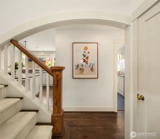 A talented young designer and her family have enjoyed this home for almost seven years, and have made some lovely systemic and cosmetic improvements throughout.  The  living room is to our right, with the spacious view dining room to our left circling around the stairs into the kitchen.  Full bath straight ahead, with a very large bedroom just to its right.