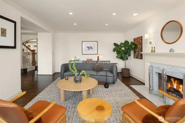A hand-woven wool runner graces the stairs, and contrast nicely (along with crisp white walls) against the walnut-stained hardwoods throughout the main floor.