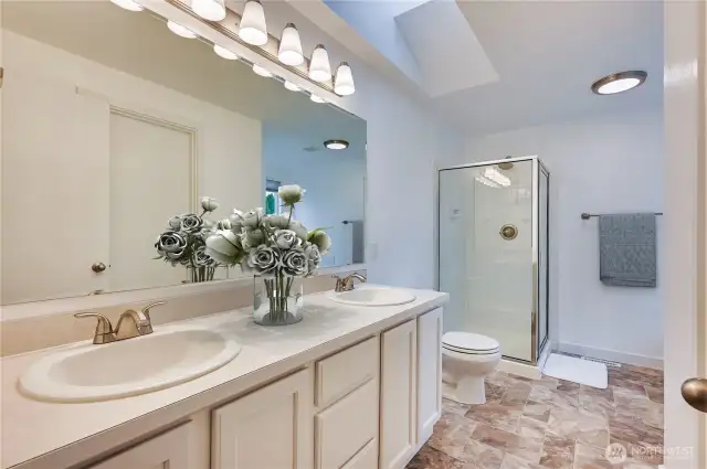 Primary bathroom with double sinks, walk-in closet, soaking tub and separate shower!