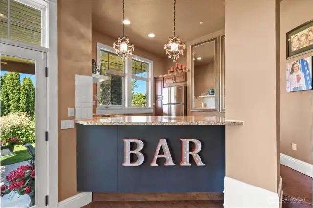 The half kitchen/bar downstairs in the lower level.