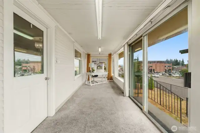 Finished, heated front porch for a street side walk up office or a space to extend your gatherings out.