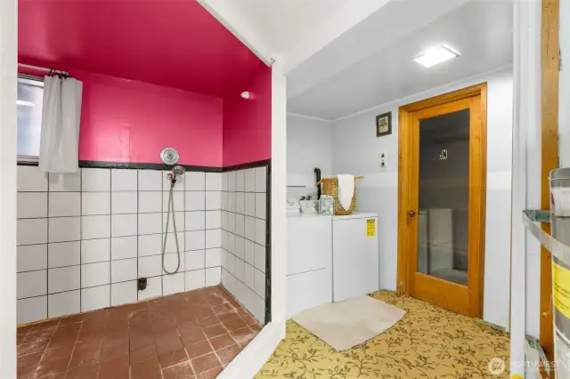 Laundry area with adjacent sauna or storage room.