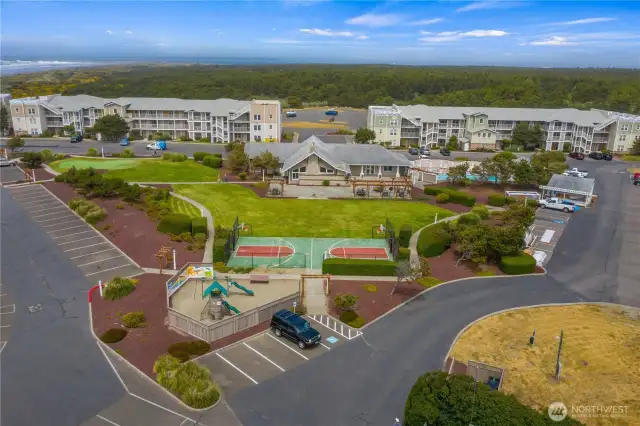 Rec center includes heated pool, hot tub, sport court, putting green, fitness center and community Bbqs