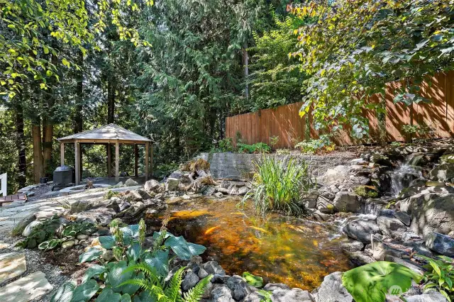 Koi pond and gazebo with firepit