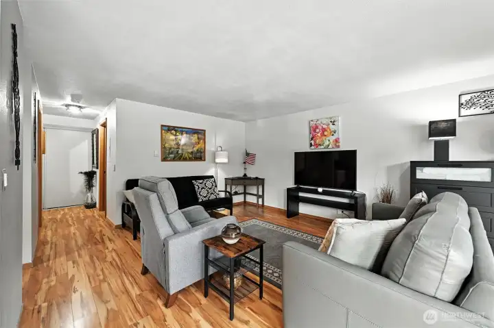 Small hallway leads you into main living space. Open and bright.
