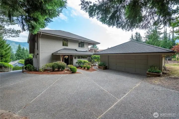 This expansive exposed aggregate courtyard is both private and spacious. The separate two car garage is fully insulated. See virtual tour link for 3D walkthrough and interactive floor plans.