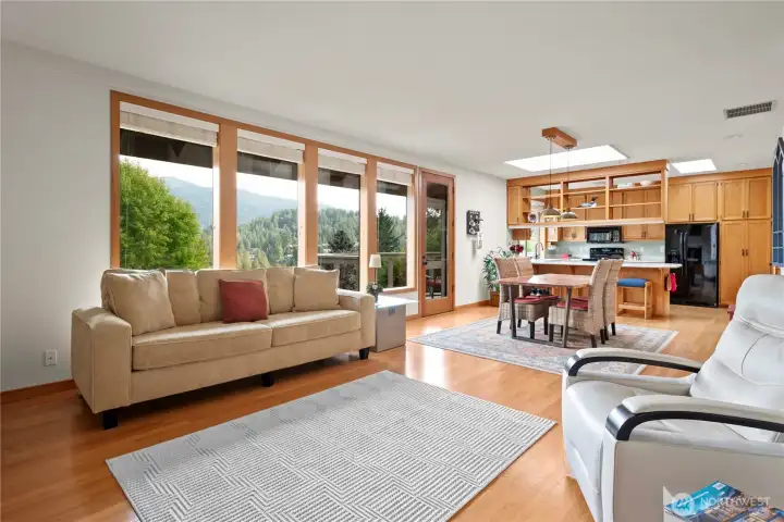 9' ceilings throughout the main floor. The abundance of natural light is captured by the windows as well as skylights.