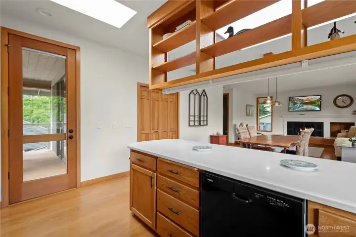 The large 8' tall glass door leads to the beautiful covered deck.
