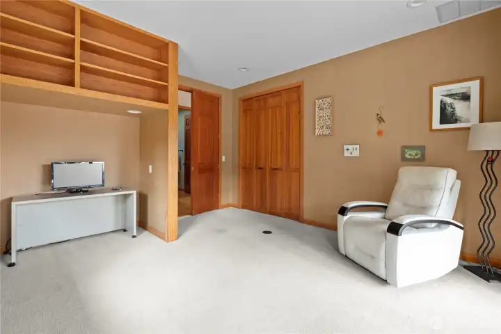 Bedroom three is large and spacious with solid wood built -ins. Notice the 8' tall solid wood doors.