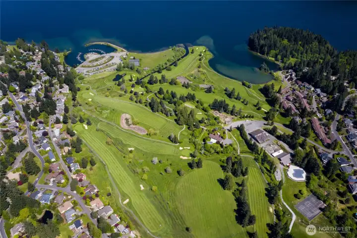 A view of the gorgeous golf course and marina on Lake Whatcom. Sudden Valley also has a pool, fitness center tennis courts and much more. A very lovely place to call home! see www.suddenvalley.com