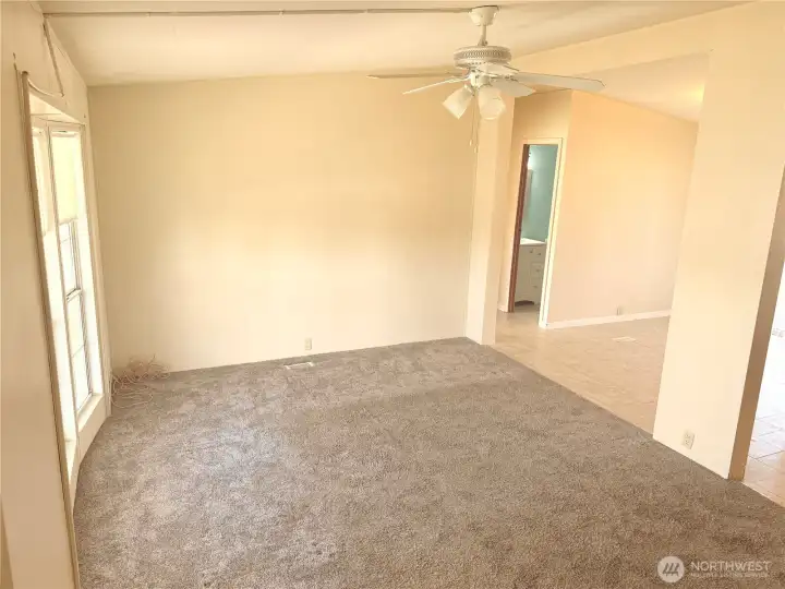 Entry to Large open Living area Connecting to Kitchen/Dining Room