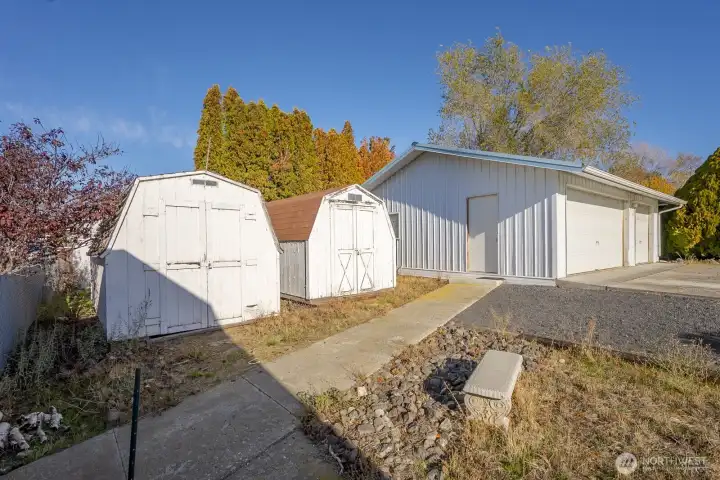 Two Sheds+ a large 3 car detached garage/shop