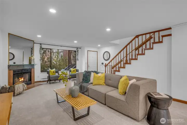 Such a great space to entertain friends.  Open concept allows flow and function. Can lighting makes the space feel open and inviting. New carpet and interior paint.